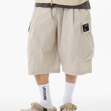 ONE-TUCK WIDE CARGO BERMUDA PANTS STONE